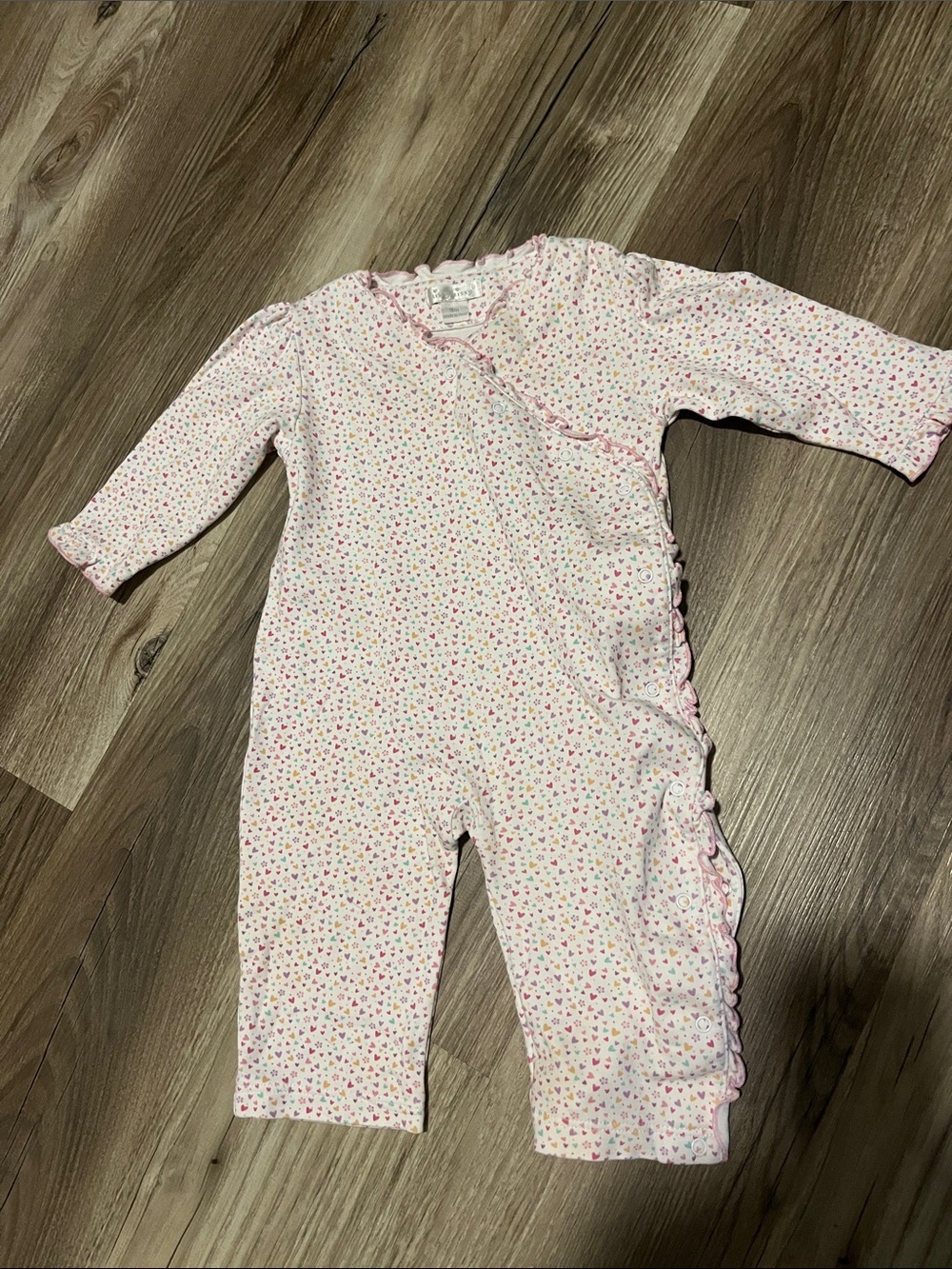 100% Pima cotton Kissy kissy heart onesie with Ruffle Trim, like new